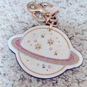 NWOT Coach Saturn bag charm gold